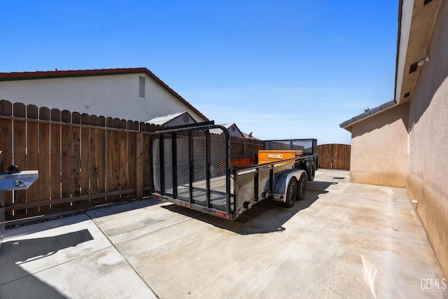 view of patio / terrace featuring fence