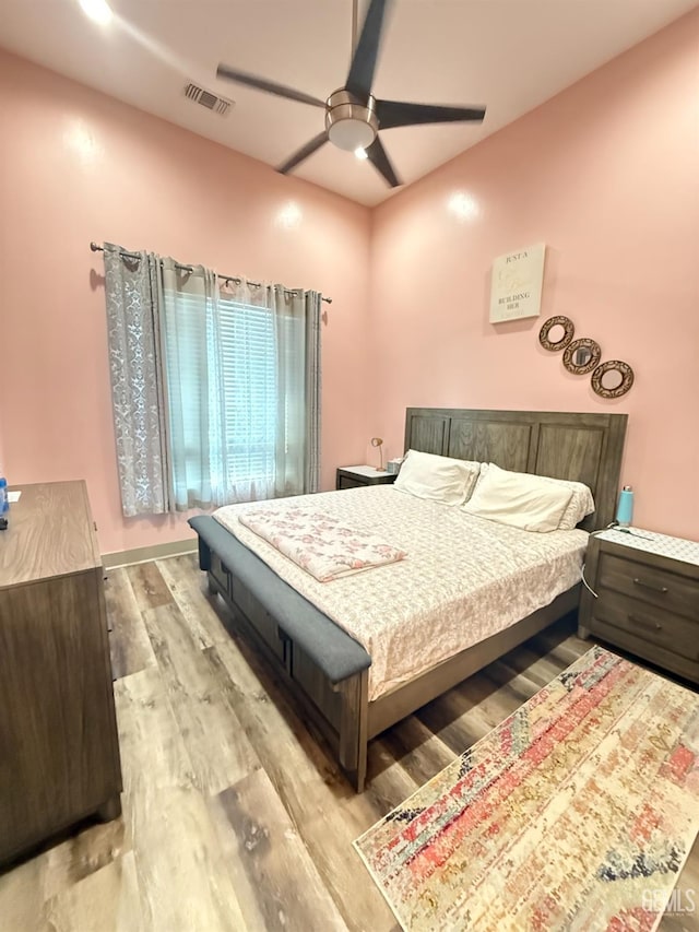 5917 Hawthorn Tree Ln, Bakersfield, CA 93313 - bedroom with wood finished floors and a ceiling fan