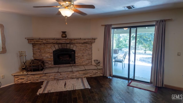 living room featuring a fireplace, ceiling fan, and hardwood / wood-style floors