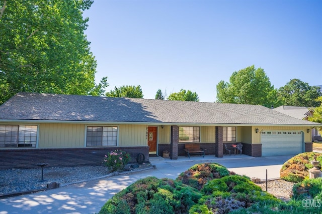 single story home featuring a garage