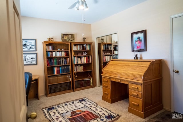 carpeted office with ceiling fan