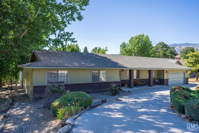 ranch-style home with a garage