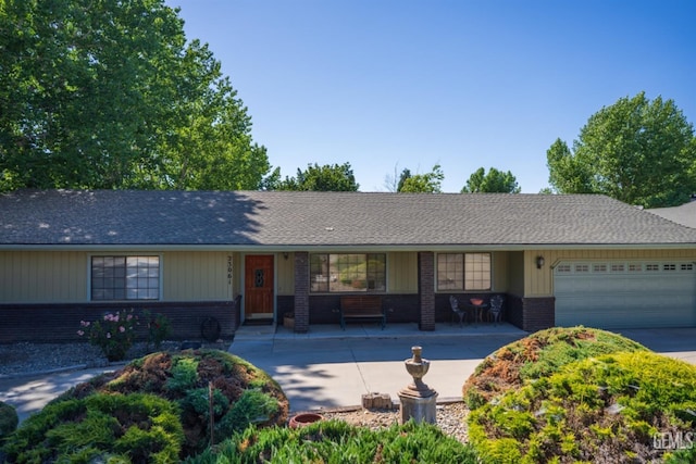 single story home featuring a garage