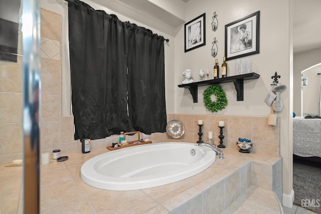 bathroom with tiled tub