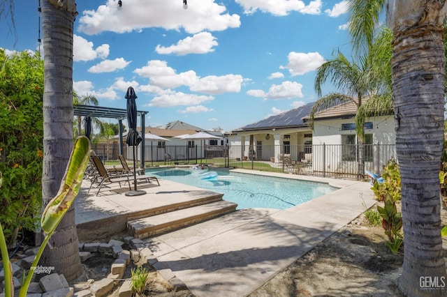 view of pool featuring a patio area