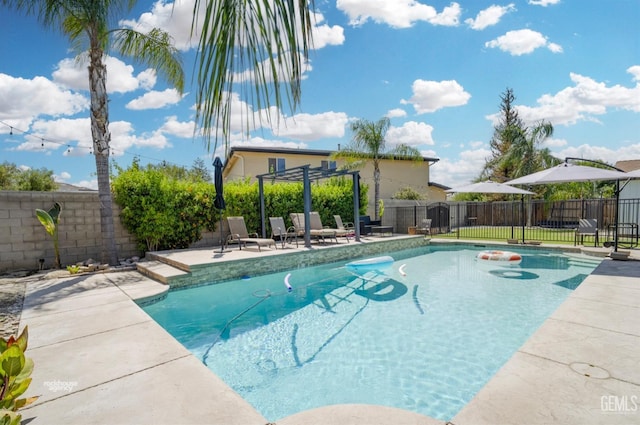 view of swimming pool with a pergola and a patio area