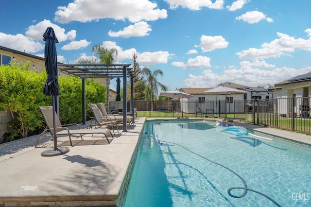 view of swimming pool featuring a pergola and a patio area