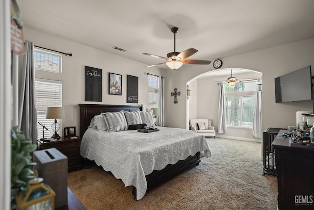 bedroom featuring ceiling fan and carpet flooring