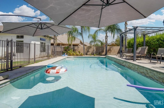 view of swimming pool with a pergola and a patio area