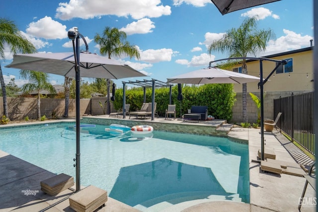 view of swimming pool featuring a pergola and a patio area