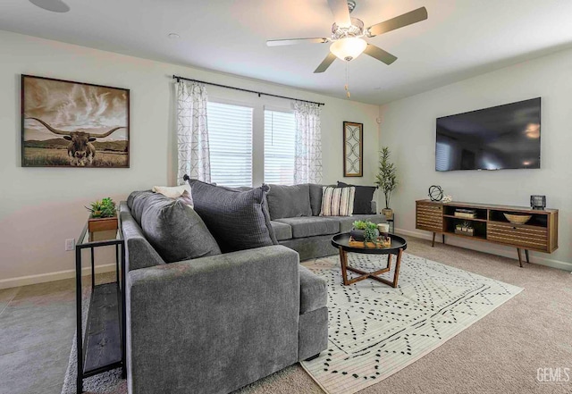 living room featuring carpet floors and ceiling fan