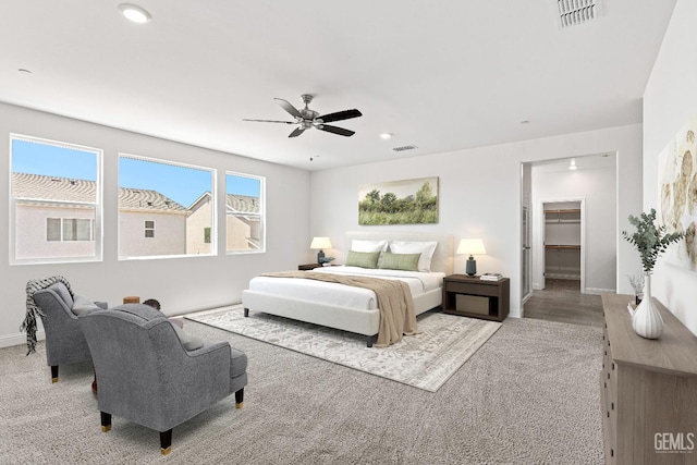 6501 Thunder Trail Dr, Bakersfield, CA 93313 - bedroom featuring recessed lighting, a walk in closet, a ceiling fan, and carpet flooring