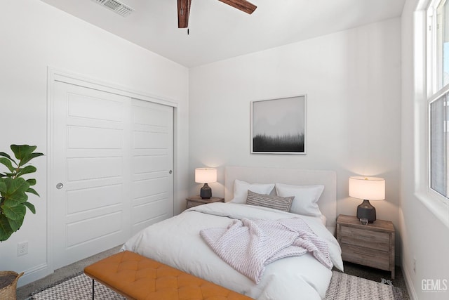 6501 Thunder Trail Dr, Bakersfield, CA 93313 - carpeted bedroom featuring multiple windows, a closet, and ceiling fan