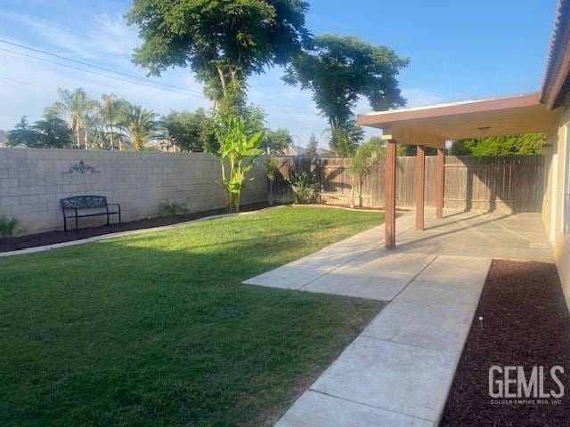 11422 Pacific Harbor Ave, Bakersfield, CA 93312 - fenced backyard with a patio