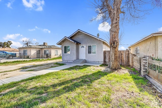 view of front of home with a front lawn