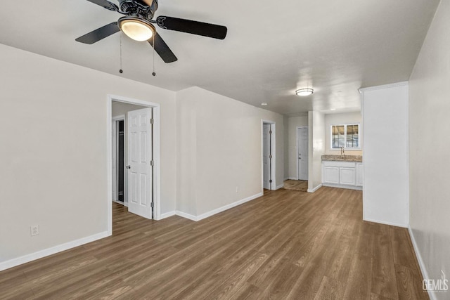 unfurnished living room featuring hardwood / wood-style floors