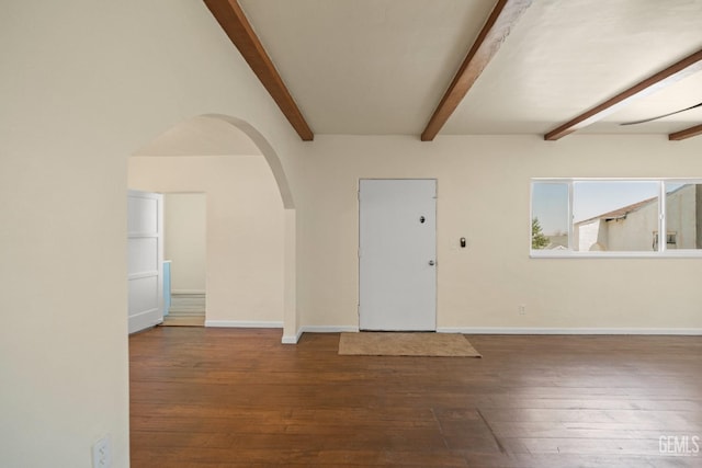 interior space featuring wood-type flooring and beam ceiling