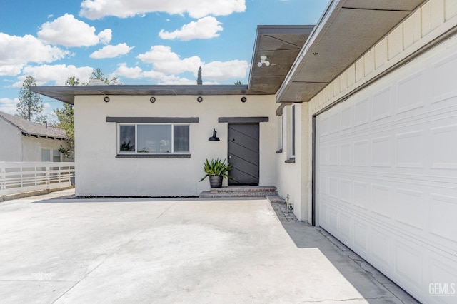 property entrance with a garage