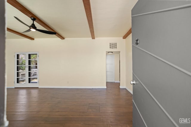 unfurnished living room with french doors, lofted ceiling with beams, ceiling fan, and dark wood-type flooring