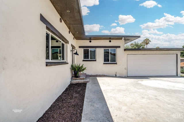 exterior space featuring a garage