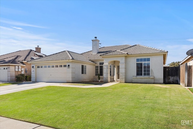 10809 Mirage Dr, Bakersfield, CA 93311 - view of front of home with a garage, a chimney, stucco siding, a tile roof, and driveway