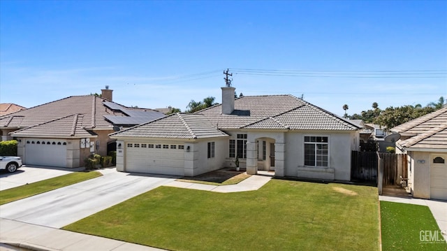 10809 Mirage Dr, Bakersfield, CA 93311 - view of front facade with a tiled roof, an attached garage, stucco siding, concrete driveway, and a chimney