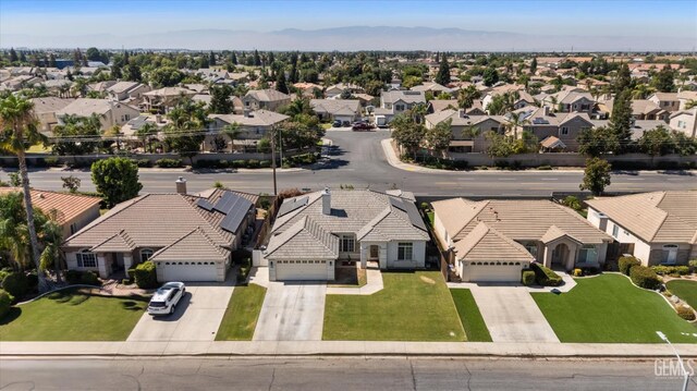 10809 Mirage Dr, Bakersfield, CA 93311 - aerial perspective of suburban area with a mountain backdrop