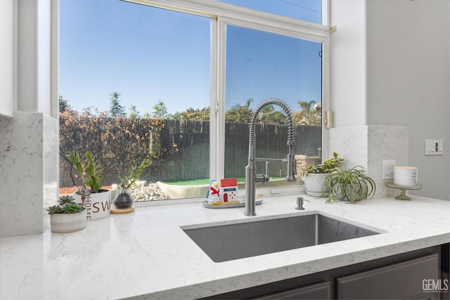 10809 Mirage Dr, Bakersfield, CA 93311 - kitchen with a sink and light stone countertops