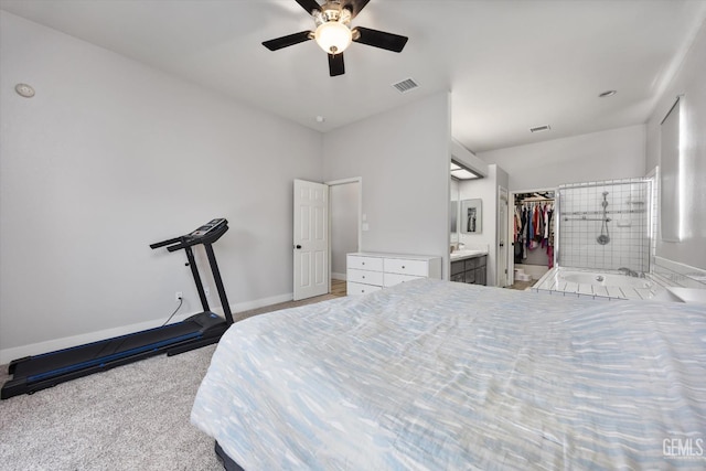 10809 Mirage Dr, Bakersfield, CA 93311 - carpeted bedroom with ensuite bathroom, a spacious closet, and ceiling fan