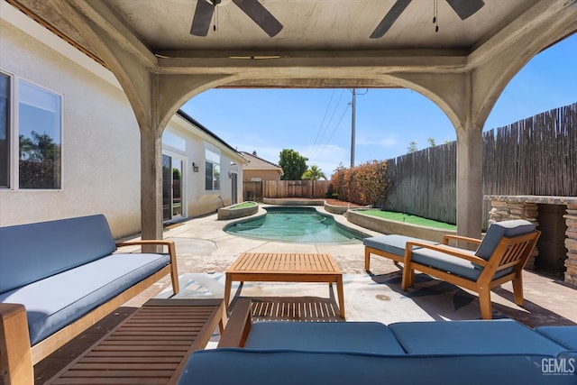 10809 Mirage Dr, Bakersfield, CA 93311 - fenced backyard with a ceiling fan, a patio, and an outdoor hangout area