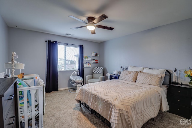 carpeted bedroom featuring ceiling fan