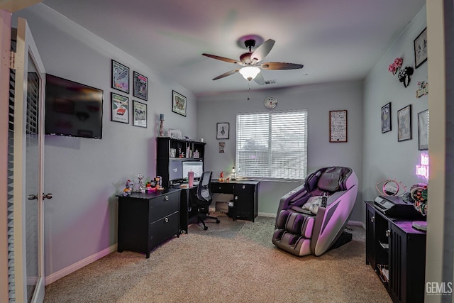 carpeted office with ceiling fan