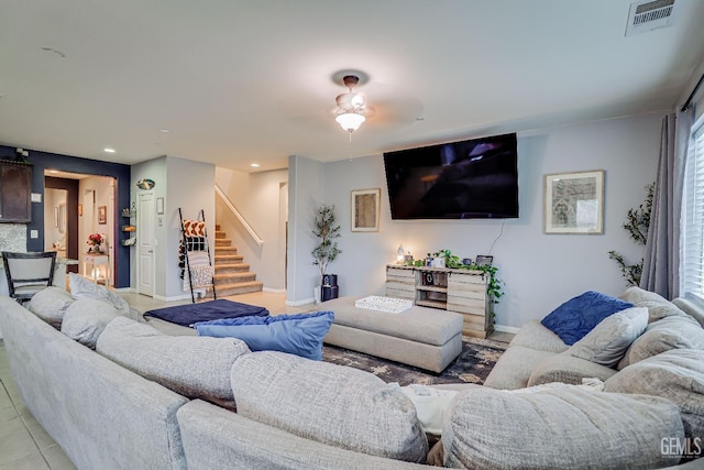 living room with light tile patterned floors