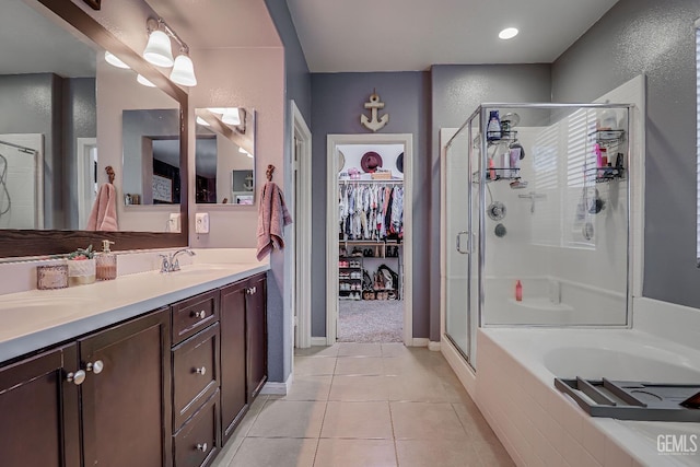 bathroom with vanity, separate shower and tub, and tile patterned flooring