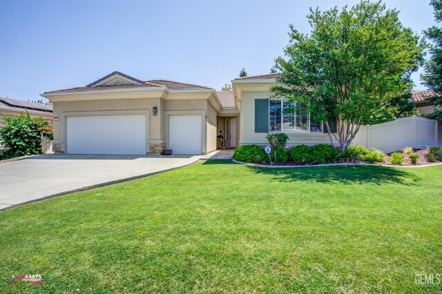 5903 Gold Ranch Way, Bakersfield, CA 93306 - view of front facade with an attached garage, stucco siding, concrete driveway, and a tiled roof