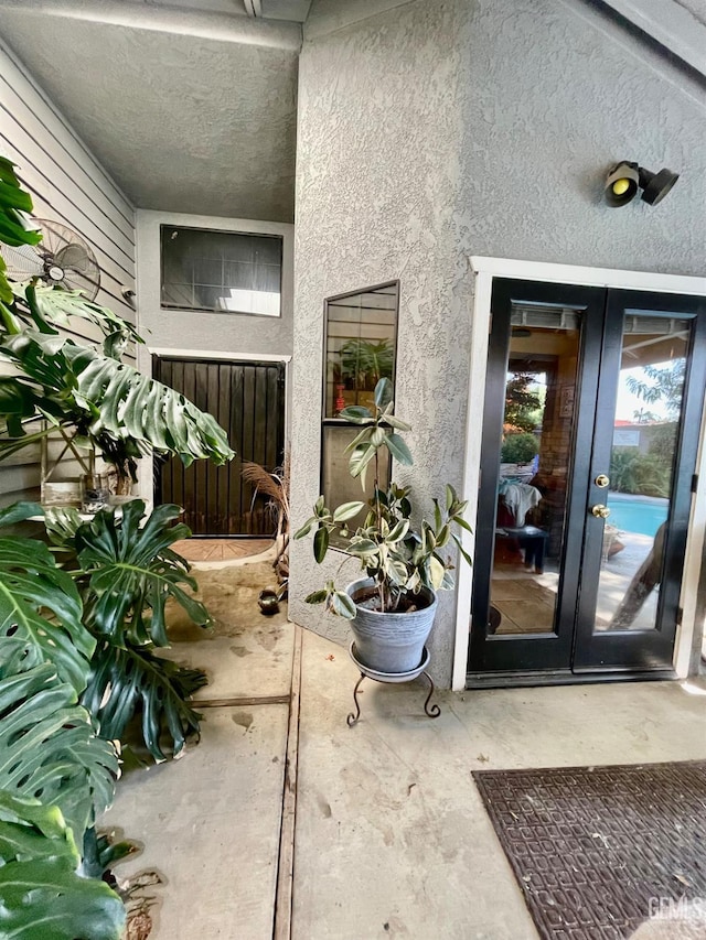 9125 Gleeson Ct, Bakersfield, CA 93311 - doorway to property with french doors and stucco siding