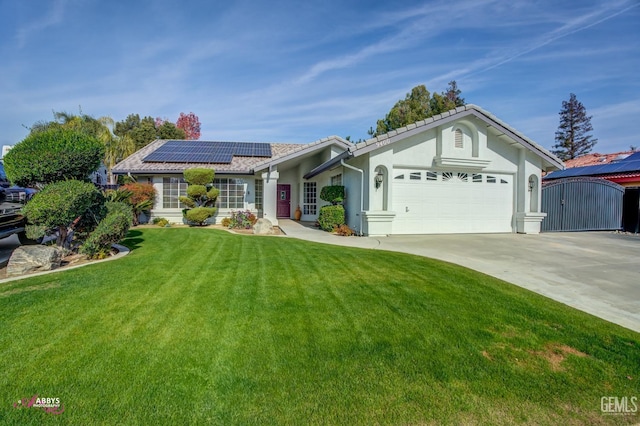 single story home featuring solar panels, a garage, and a front lawn