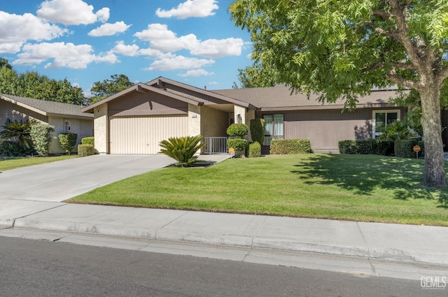 single story home with a front lawn and a garage