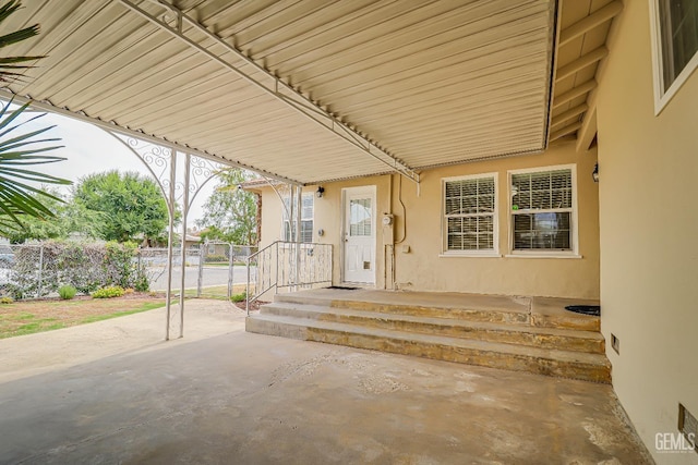 view of patio / terrace featuring fence