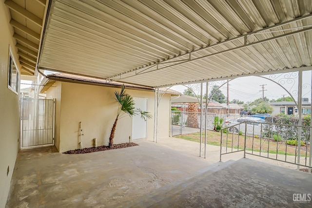 view of patio featuring fence