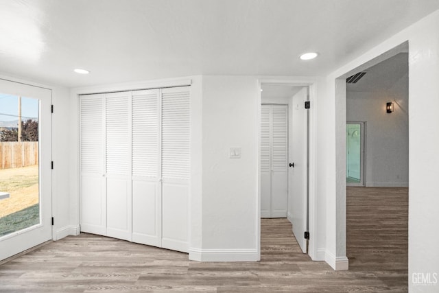 19701 Mesa Dr, Tehachapi, CA 93561 - unfurnished bedroom featuring access to outside, recessed lighting, wood finished floors, and a closet