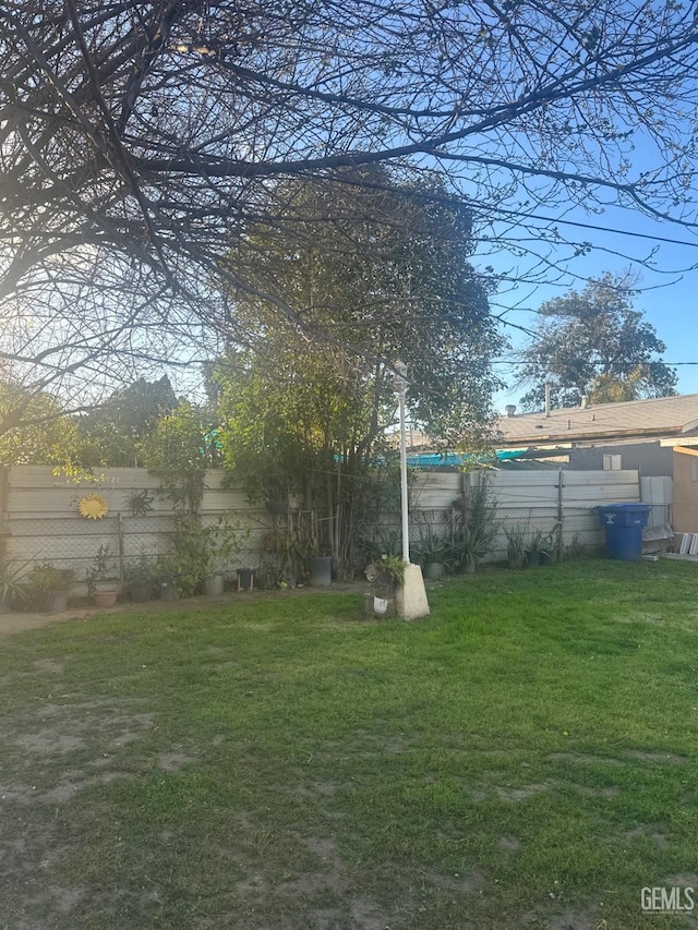 view of yard featuring fence