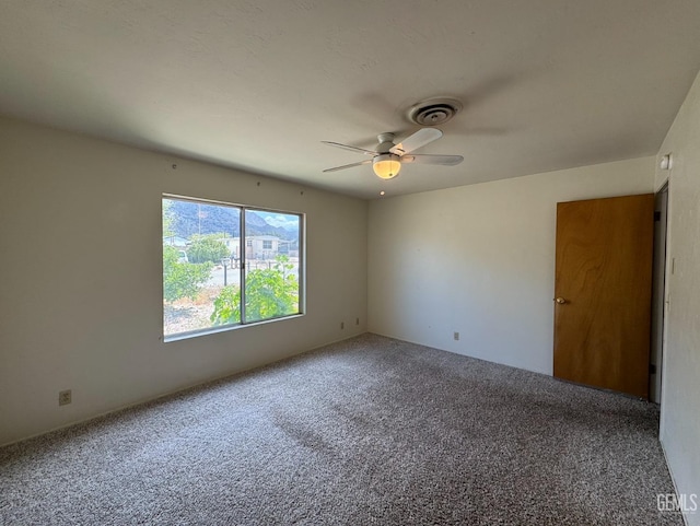 2701 Pinon St, Lake Isabella, CA 93240 - carpeted spare room with a ceiling fan and visible vents