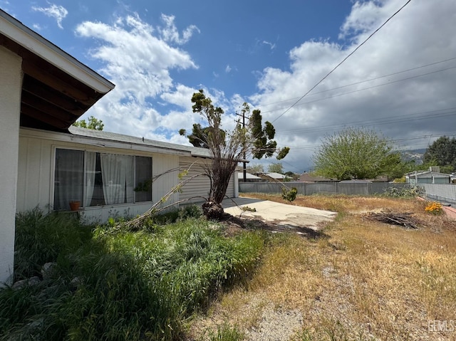 2701 Pinon St, Lake Isabella, CA 93240 - view of yard featuring concrete driveway, fence, and a patio area