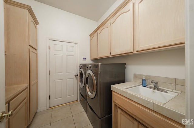 3718 Sycamore Creek Dr, Bakersfield, CA 93313 - laundry area featuring independent washer and dryer, cabinet space, and light tile patterned floors
