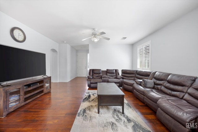 6202 Ocean Jasper Dr, Bakersfield, CA 93313 - living area with wood finished floors, ceiling fan, and arched walkways