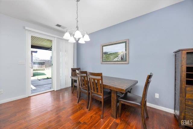 6202 Ocean Jasper Dr, Bakersfield, CA 93313 - dining space featuring a chandelier and wood finished floors