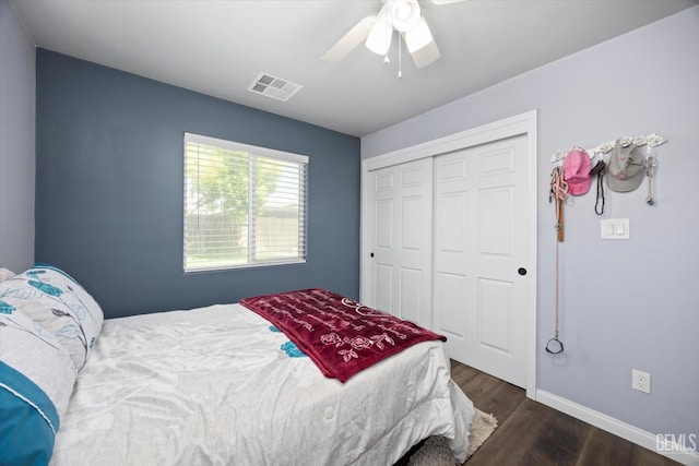 6202 Ocean Jasper Dr, Bakersfield, CA 93313 - bedroom featuring dark wood-style floors, a closet, and a ceiling fan