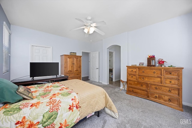 6202 Ocean Jasper Dr, Bakersfield, CA 93313 - bedroom with arched walkways, carpet floors, and ceiling fan