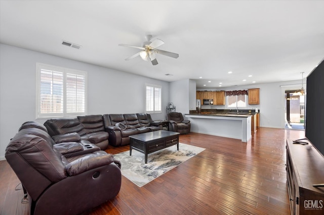 6202 Ocean Jasper Dr, Bakersfield, CA 93313 - living room with ceiling fan, recessed lighting, and wood finished floors